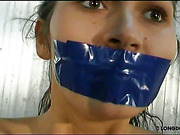 Tits and pussy of gagged teeny were whipped
